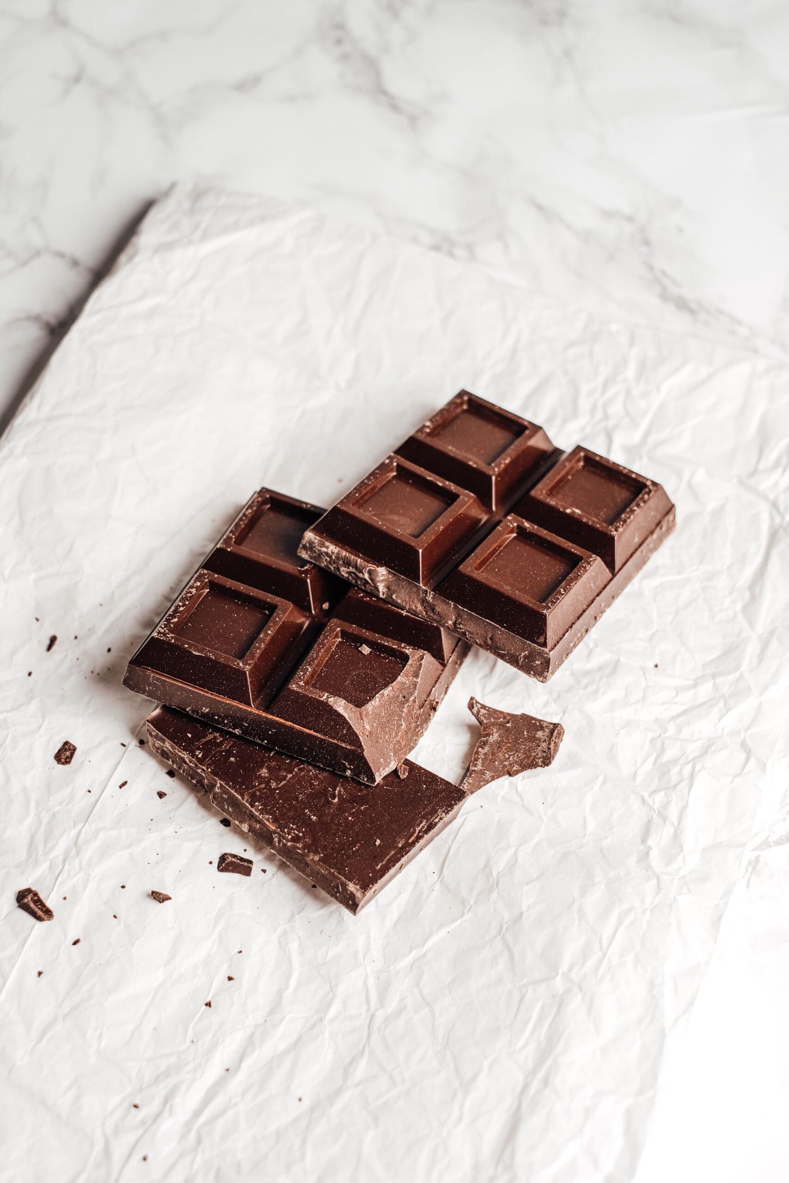 Chocolate bar broken into pieces, a common toxic hazard for dogs